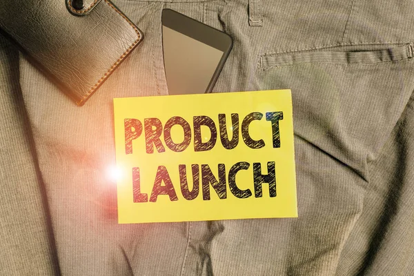 Word writing text Product Launch. Business concept for process to introduce new product for sale for the first time Smartphone device inside trousers front pocket with wallet and note paper. — Stockfoto