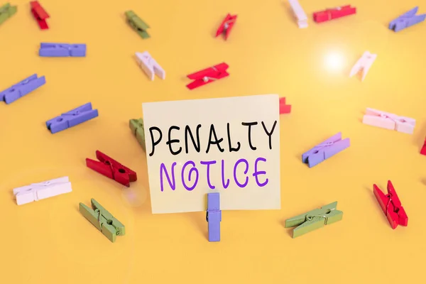 Writing note showing Penalty Notice. Business photo showcasing the immediate fine given to showing for minor offences Colored clothespin papers empty reminder yellow floor background office. — 스톡 사진