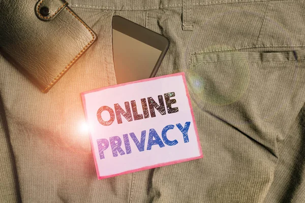 Handwriting text Online Privacy. Concept meaning involves the control of what information you reveal online Smartphone device inside trousers front pocket with wallet and note paper. — Stockfoto