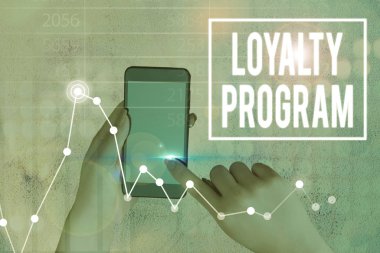 Conceptual hand writing showing Loyalty Program. Business photo text marketing effort that provide incentives to repeat customers.