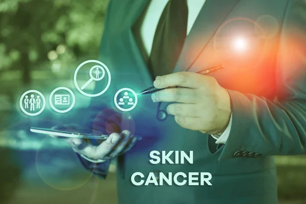 Writing note showing Skin Cancer. Business photo showcasing uncontrolled growth of abnormal skin cells due to sun exposure.
