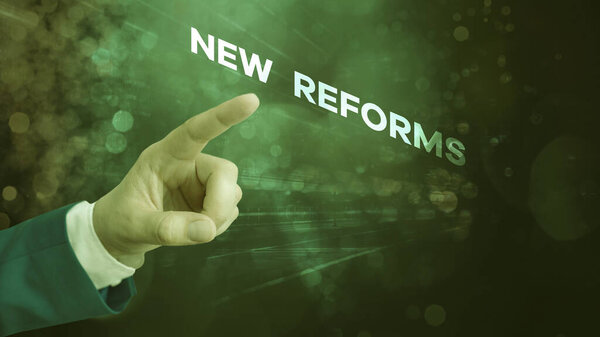 Conceptual hand writing showing New Reforms. Business photo text to amend or improve by change of form or removal of faults.
