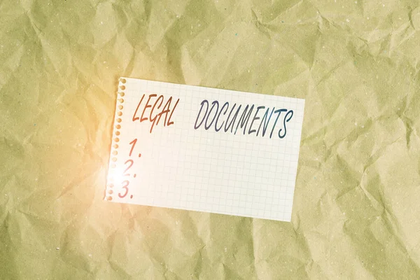 Text sign showing Legal Documents. Conceptual photo a document concerning a legal matter Drawn up by a lawyer Papercraft craft paper desk square spiral notebook office study supplies.