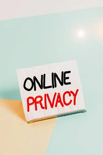 Writing note showing Online Privacy. Business photo showcasing involves the control of what information you reveal online Paper on buffer wire on soft pastel multi colours backdrop.