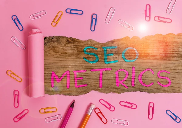 Handschrift tekst Seo Metrics. Concept betekent meten van de perforanalyse van de website voor organische zoekresultaten. — Stockfoto