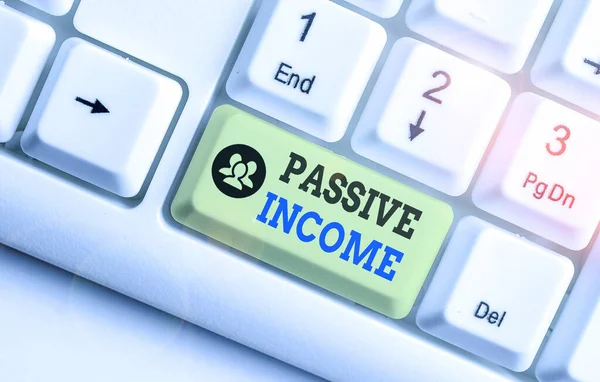 Conceptual hand writing showing Passive Income. Business photo text the earnings derived from a rental property and others. — Stock Photo, Image