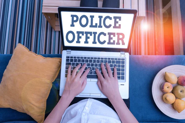Writing note showing Police Officer. Business photo showcasing a demonstrating who is an officer of the law enforcement team. — Stockfoto