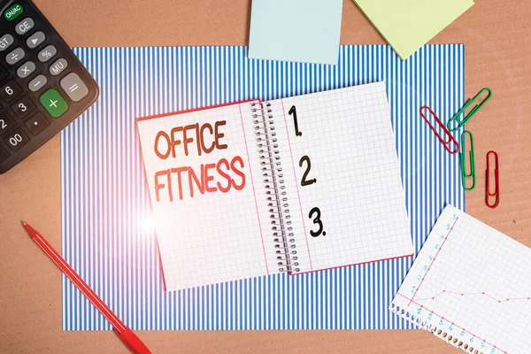 Conceptual hand writing showing Office Fitness. Business photo text Encouraging fitness and balance lifestyle in the workplace Striped paperboard cardboard office study supplies chart.