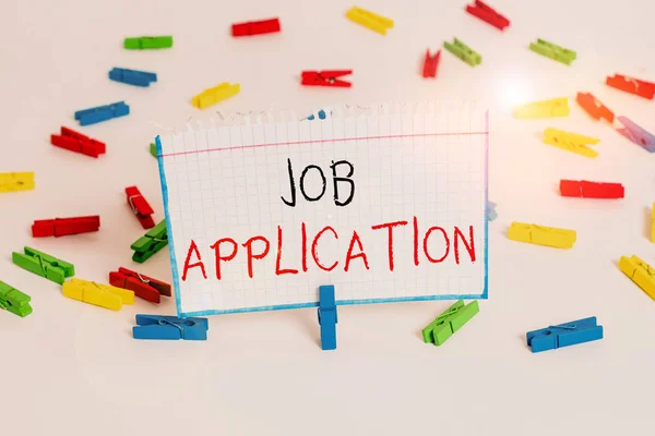 Text sign showing Job Application. Conceptual photo paper which indicates interest in a particular vacancy Colored clothespin papers empty reminder white floor background office. — Stock Photo, Image