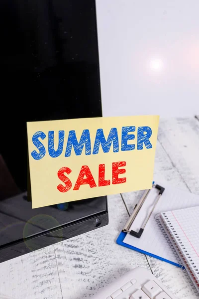 Text sign showing Summer Sale. Conceptual photo time when a store sells products at much lower prices than usual Note paper taped to black computer screen near keyboard and stationary. — Stock Photo, Image