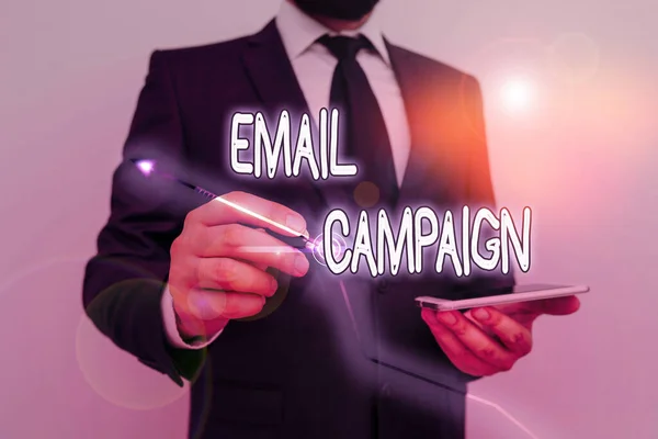 Conceptual hand writing showing Email Campaign. Business photo showcasing advertisements are sent to a targeted list of recipients.