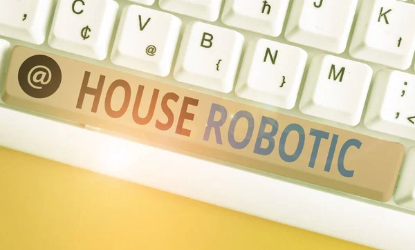 手書きテキスト執筆｜House Robotic.家庭の家事を行うプログラム可能なパワーマシンを意味する概念. — ストック写真