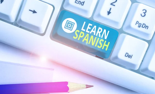 Word writing text Learn Spanish. Business concept for gain or acquire knowledge of speaking and writing Spanish. — Stok fotoğraf