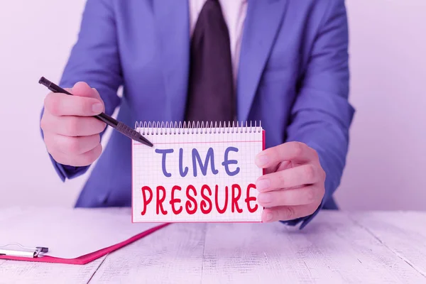 Text sign showing Time Pressure. Conceptual photo get things done in less time than is needed or desired Man holds empty paper with copy space in front of him Copy Space.
