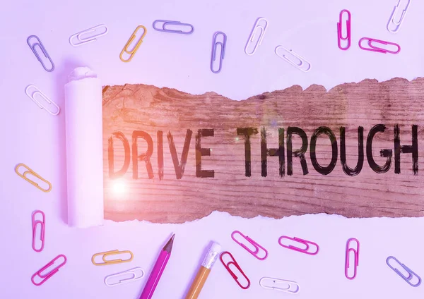Text sign showing Drive Through. Conceptual photo place where you can get type of service by driving through it.