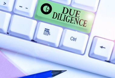Due Diligence 'ı gösteren metin işareti. Kavramsal fotoğraf. Haksız fiil işlemekten kaçınmak için yapılan rasyonel adımlar..