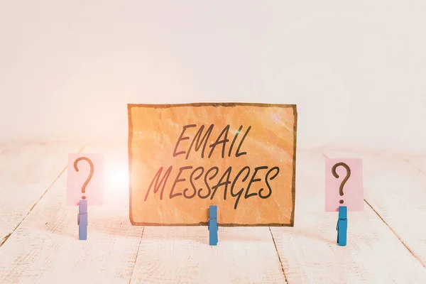 Writing note showing Email Messages. Business photo showcasing a messages that has been sent using electronic mail Crumbling sheet with paper clips placed on the wooden table. — Stok fotoğraf