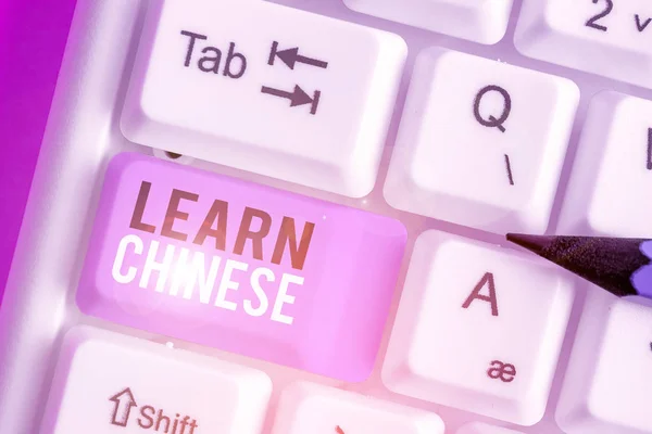 Writing note showing Learn Chinese. Business photo showcasing gain or acquire knowledge in writing and speaking Chinese. — Stockfoto