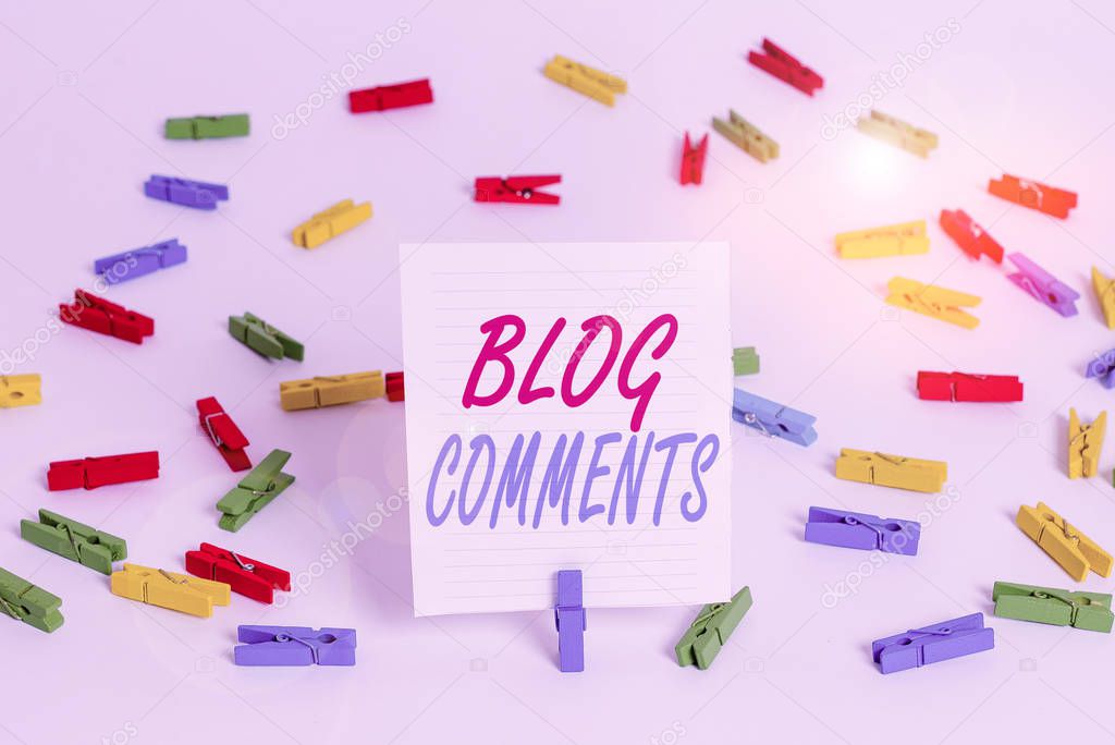 Conceptual hand writing showing Blog Comments. Business photo showcasing Space at the end of each post for a reader to leave a comment Colored clothespin papers empty reminder white floor office.