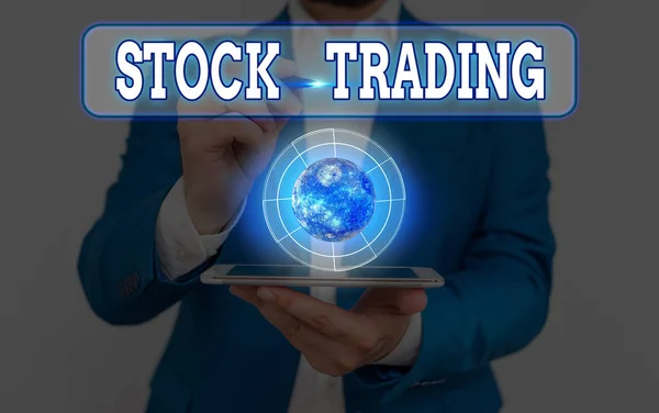 Konceptuell handstil som visar aktiehandel. Affärsfoto text åtgärden eller aktiviteten att köpa och sälja aktier på marknaden Delar av denna bild som tillhandahålls av Nasa. — Stockfoto