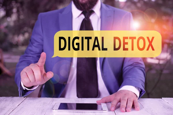 Handwriting text Digital Detox. Concept meaning period of time during a demonstrating stops from using gadgets Businessman with pointing finger in front of him. — 스톡 사진