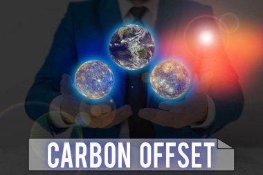 Word writing text Carbon Offset. Business concept for Reduction in emissions of carbon dioxide or other gases Elements of this image furnished by NASA. clipart