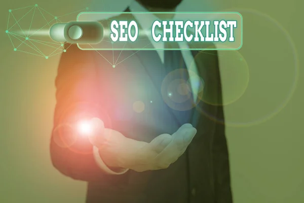 Texto de escritura Seo Checklist. Concepto que significa lista de elementos requeridos para optimizar el motor de búsqueda . — Foto de Stock
