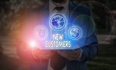 Text sign showing New Customers. Conceptual photo an entity that has not previously purchased one goods Elements of this image furnished by NASA.