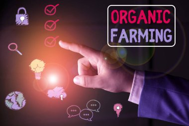 Conceptual hand writing showing Organic Farming. Business photo text agricultural system that use ecologically based pest control.