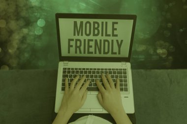 Word writing text Mobile Friendly. Business concept for website is designed to display on a mobile device correctly.