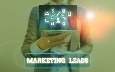Conceptual hand writing showing Marketing Leads. Business photo text demonstrating who shows interest in the brand or products.