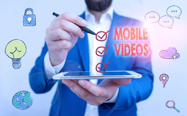 Writing note showing Mobile Videos. Business photo showcasing electronic media which is viewed or used on mobile phones. — 스톡 사진