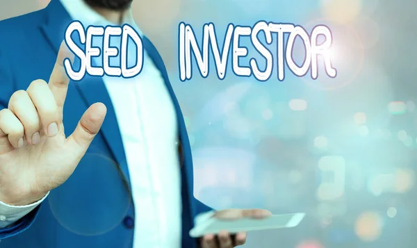 Texto de escritura de palabras Seed Investor. Concepto de negocio para la fuente de dinero inicial necesaria para iniciar un nuevo negocio . —  Fotos de Stock