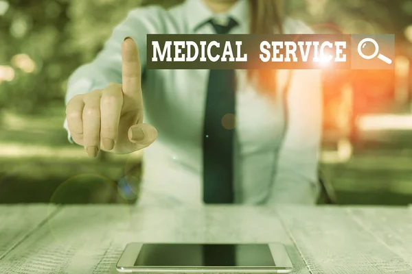 Word writing text Medical Service. Business concept for treat illnesses and injuries that require medical response Female business person sitting by table and holding mobile phone. — Stockfoto