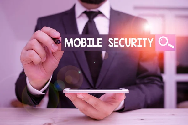 Conceptual hand writing showing Mobile Security. Business photo showcasing efforts to secure data on mobile devices such as smartphones Male human wear formal clothes present use hitech smartphone. — Stockfoto