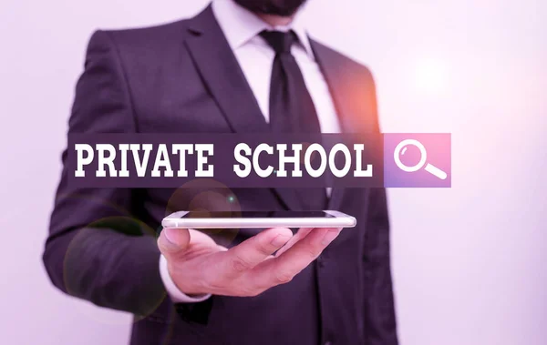 Conceptual hand writing showing Private School. Business photo showcasing an independent school supported wholly by the payment of fees Male human wear formal work suit hold smartphone using hand. — Stockfoto