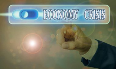Writing note showing Economy Crisis. Business photo showcasing the economy of a country experiences a sudden downturn.