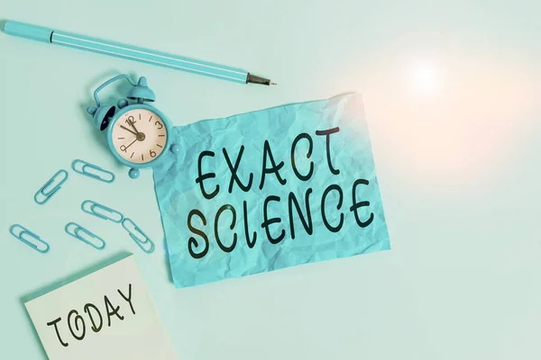 Handwriting text writing Exact Science. Concept meaning the precise predictions and rigorous methods of testing Alarm clock clips notepad blank crushed sheet marker sky colored background. — Stockfoto