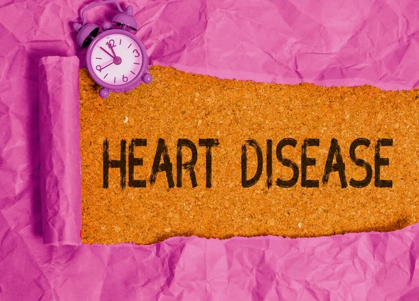 Writing note showing Heart Disease. Business photo showcasing class of diseases that involve the heart or blood vessels. — Stock Photo, Image