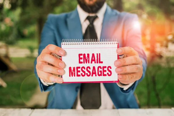 Handwriting text Email Messages. Concept meaning a messages that has been sent using electronic mail Man holds empty paper with copy space in front of him. — Stockfoto