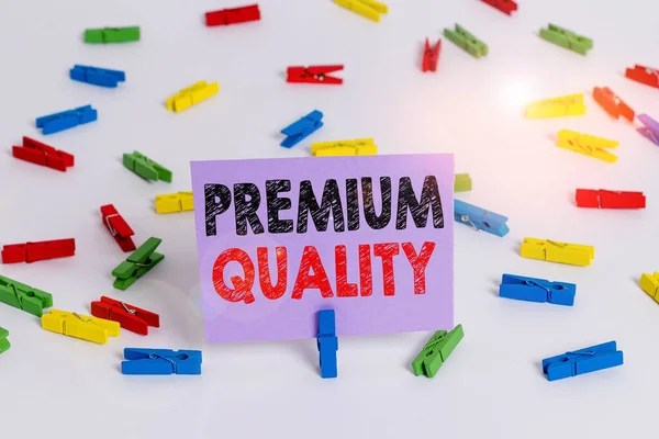 Word writing text Premium Quality. Business concept for something or someone of greater or superior quality Colored clothespin papers empty reminder white floor background office. — Stock Photo, Image