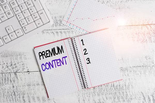 Text sign showing Premium Content. Conceptual photo higher quality or more desirable than free content Papercraft craft paper desk square spiral notebook office study supplies. — Stockfoto