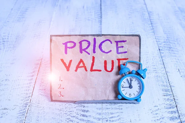 Word writing text Price Value. Business concept for the price of a product based on what customers think or valued Mini blue alarm clock stand tilted above buffer wire in front of notepaper. — Stock Photo, Image