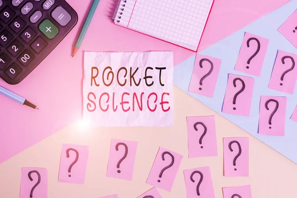 Handwriting text writing Rocket Science. Concept meaning difficult activity that you need to be intelligent to do Mathematics stuff and writing equipment above pastel colours background. — Zdjęcie stockowe
