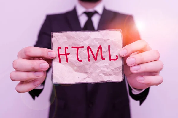 Word writing text Html. Business concept for the lingua franca for publishing hypertext on the World Wide Web Male human wear formal work suit office look hold notepaper sheet use hand. — Stockfoto