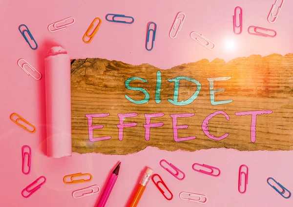 Handwriting text Side Effect. Concept meaning typically undesirable effect of a drug or medical treatment.
