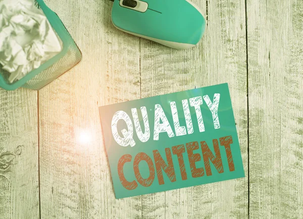 Word writing text Quality Content. Business concept for content that delivers value and consists of great writing Crumpled paper in bin and computer mouse with stationary on wooden backdrop. — Stockfoto