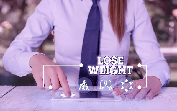 Text sign showing Lose Weight. Conceptual photo the fact of a demonstrating s is or an animal s is body weight becoming less.