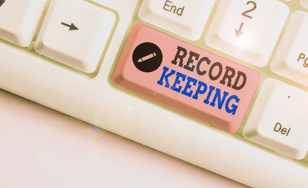 Handwriting text Record Keeping. Concept meaning The activity or occupation of keeping records or accounts.