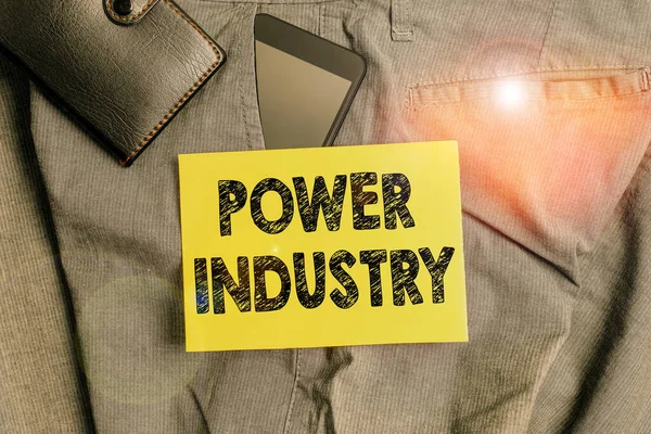 Word writing text Power Industry. Business concept for industries involved in the production and sale of energy Smartphone device inside trousers front pocket with wallet and note paper. — ストック写真